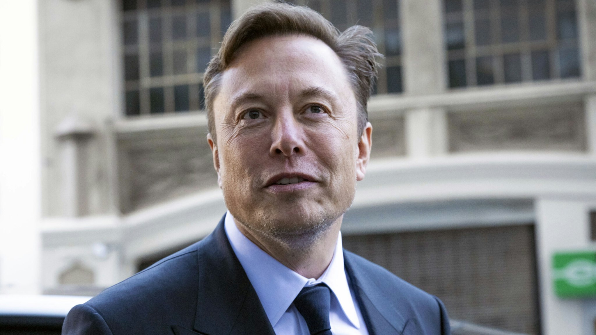 Elon Musk, chief executive officer of Tesla Inc., departs court in San Francisco, California, US, on Tuesday, Jan. 24, 2023. Investors suing Tesla and Musk argue that his August 2018 tweets about taking Tesla private with funding secured were indisputably false and cost them billions of dollars by spurring wild swings in Tesla's stock price.