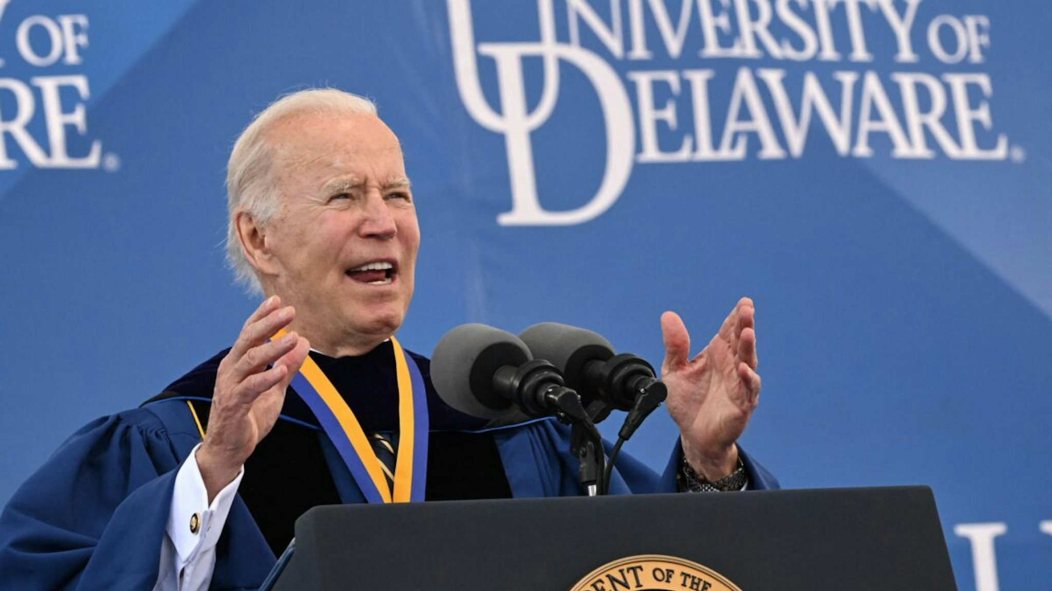 US President Joe Biden delivers the commencement address for his alma mater, the University of Delaware, at Delaware Stadium, in Newark, Delaware, on May 28, 2022.