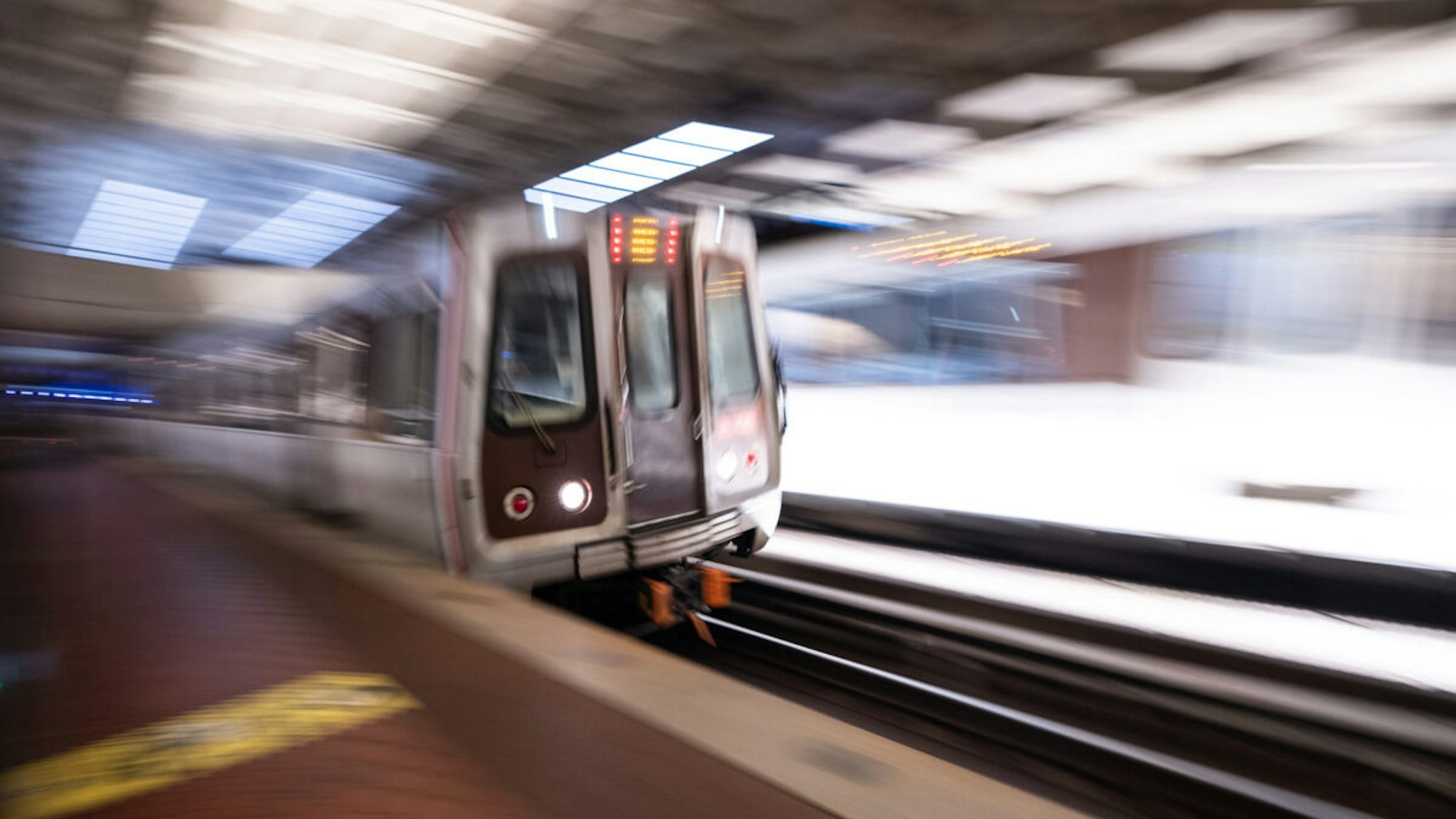 A Red Line Metro train arrives in the Metro Center station in Washington on Monday, July 25, 2022.