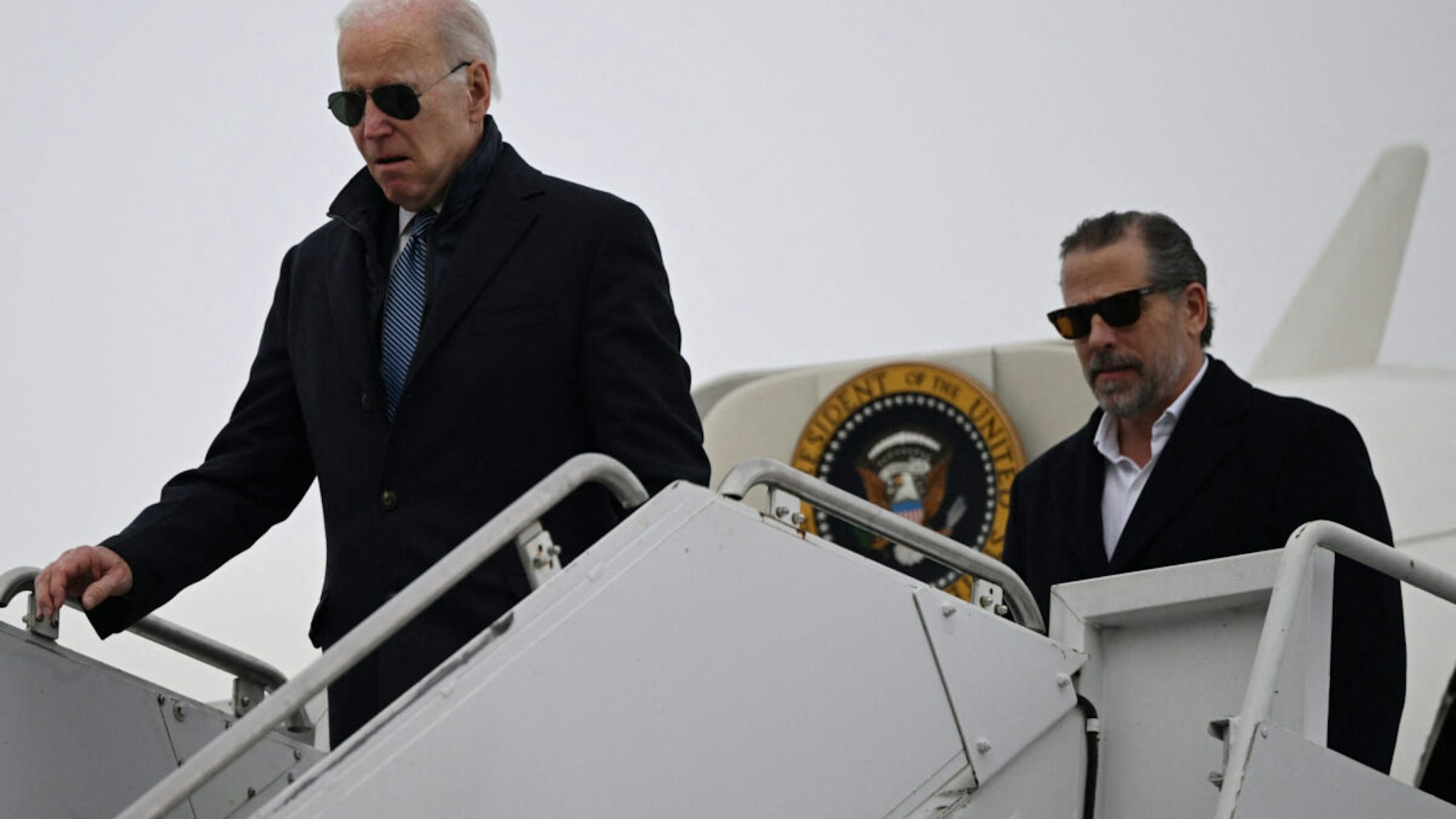 US President Joe Biden, with son Hunter Biden, arrives at Hancock Field Air National Guard Base in Syracuse, New York, on February 4, 2023.