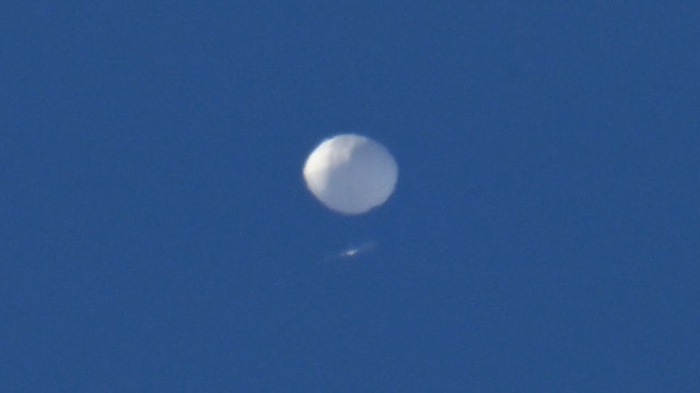 CHARLOTTE, USA - FEBRUARY 4: Chinese spy balloon flies above in Charlotte NC, United States on February 04, 2023. The Pentagon announced earlier that it is tracking a suspected Chinese high-altitude surveillance balloon above the continental US. A Chinese Foreign Ministry statement said the balloon was a âcivilian airship used for research, mainly meteorological purposes." (