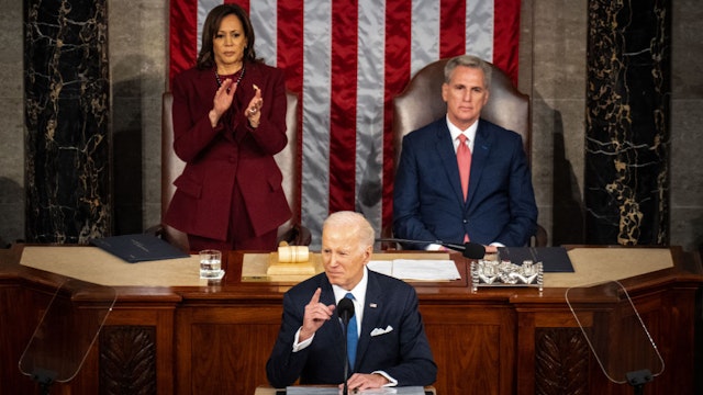 WASHINGTON, DC - FEBRUARY 07: President Joe Biden speaks as Vice President Kamala Harris, left, and Speaker of the House Kevin McCarthy (R-CA), right, listen during a State of the Union address at the U.S. Capitol on Tuesday, Feb. 7, 2023 in Washington, DC. (Kent Nishimura / Los Angeles Times via Getty Images)