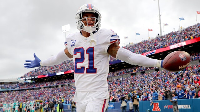 ORCHARD PARK, NEW YORK - OCTOBER 31: Jordan Poyer #21 of the Buffalo Bills celebrates after making an interception in the fourth quarter against the Miami Dolphins at Highmark Stadium on October 31, 2021 in Orchard Park, New York.