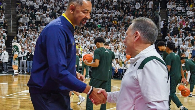 Head Basketball Coach Tom Izzo (R) of the Michigan State Spartans and Head Basketball Coach Juwan Howard (L) of the Michigan Wolverines shake hands before a college basketball game at Breslin Center on January 07, 2023 in East Lansing, Michigan