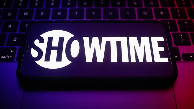 Showtime logo displayed on a phone screen and a laptop keyboard are seen in this illustration photo taken in Krakow, Poland on January 30, 2023.