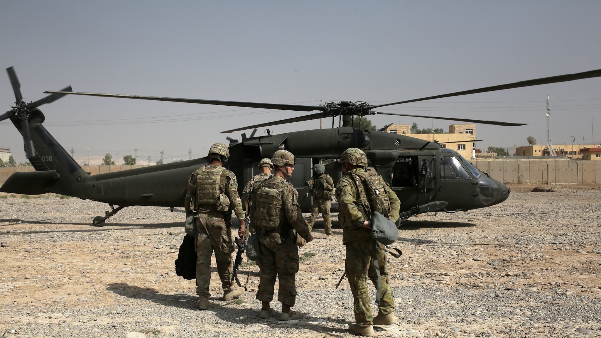 NINEVEH, IRAQ - OCTOBER 19: US soldiers leave Nineveh Joint Operations Command Headquarters with helicopters to go to Al-Kayyara district and around Mosul, in Nineveh, Iraq on October 19, 2016.