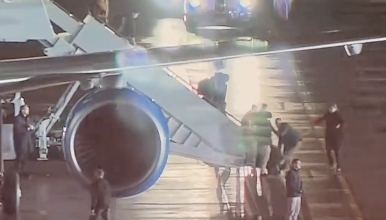 WATCH: Mystery Member Of Biden Entourage Tumbles Down Air Force One Stairs, Recalling Biden’s Famous Trip