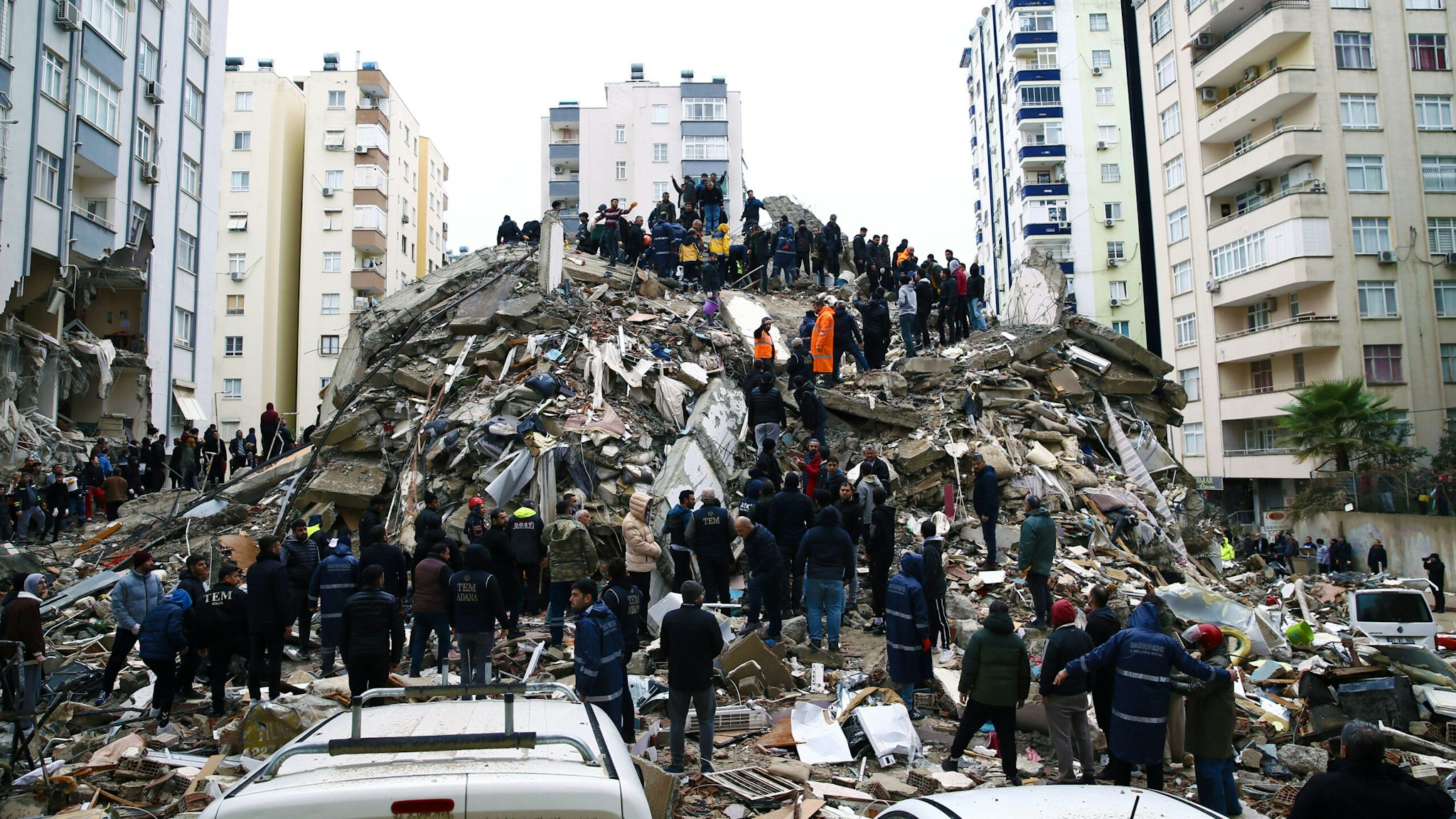 ADANA, TURKIYE - FEBRUARY 06: Search and rescue operation is being carried out at the debris of a building in Cukurova district of Adana after a 7.4 magnitude earthquake hit southern provinces of Turkiye, in Adana, Turkiye on February 6, 2023.