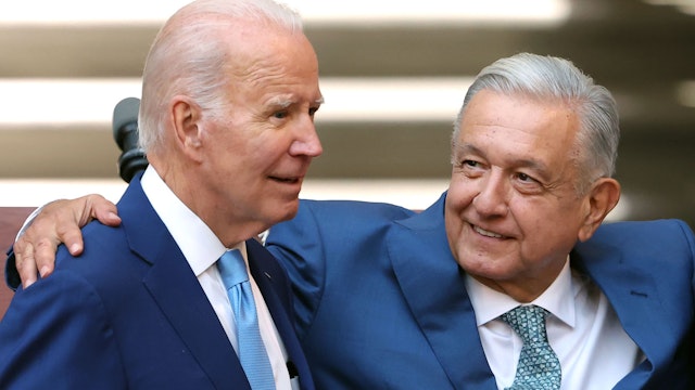 MEXICO CITY, MEXICO - JANUARY 10: U.S. President Joe Biden, President of Mexico Andres Manuel Lopez Obrador and Prime Minister of Canada Justin Trudeau hug each other during a message for the media as part of the '2023 North American Leaders' Summit at Palacio Nacional on January 10, 2023 in Mexico City, Mexico. President Lopez Obrador, USA President Joe Biden and Canadian Prime Minister Justin Trudeau gather in Mexico from January 9 to 11 as part of the 10th North American Leaders' Summit. The agenda includes topics on the climate change, immigration, trade and economic integration, security among others.
