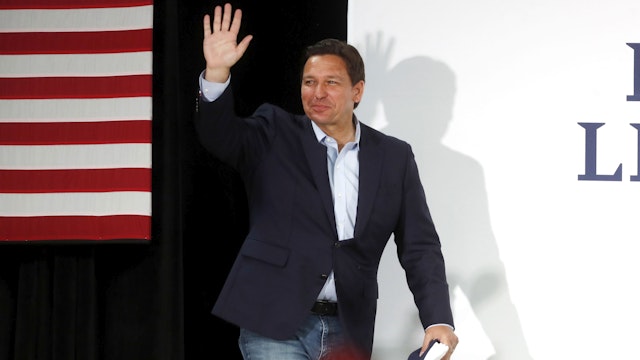 SUN CITY, FL - NOVEMBER 06: Republican incumbent Florida Gov. Ron DeSantis walks on stage to give a campaign speech at the SCC Community Hall on November 6, 2022 in Sun City Center, Florida. DeSantis is facing off against Democratic gubernatorial candidate Charlie Crist on November 8th.