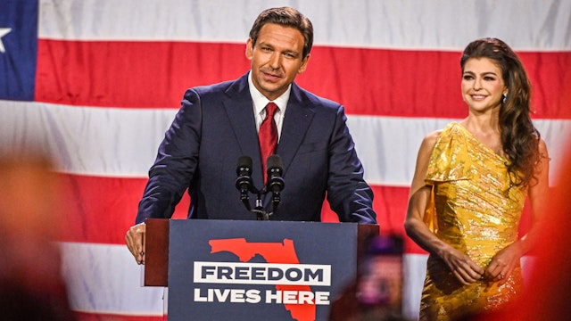 TOPSHOT - Republican gubernatorial candidate for Florida Ron DeSantis with his wife Casey DeSantis speaks during an election night watch party at the Convention Center in Tampa, Florida, on November 8, 2022. - Florida Governor Ron DeSantis, who has been tipped as a possible 2024 presidential candidate, was projected as one of the early winners of the night in Tuesday's midterm election.