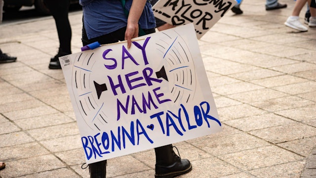 ATLANTA, GA - MARCH 13: Demonstrators march through downtown in honor of Breonna Taylor on March 13, 2021 in Atlanta, Georgia. Today marks the one year anniversary of the death of Breonna Taylor, Taylor was shot during a “no-knock” raid by police. A year in, none of the officers who fired a total of 32 rounds face any criminal charges in Taylor’s death. (Photo by Megan Varner/Getty Images)