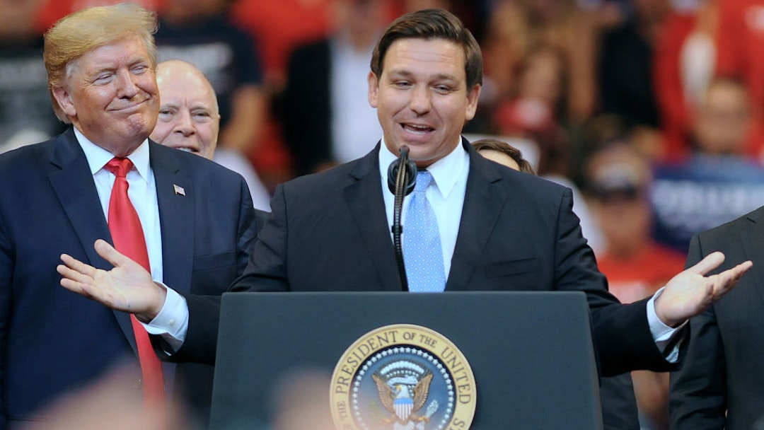 SUNRISE, FLORIDA, UNITED STATES - 2019/11/26: U.S. President Donald Trump looks on as Florida Governor Ron DeSantis speaks during the Florida Homecoming rally at the BB&amp;T Center. Trump recently became an official resident of the state of Florida. (Photo by Paul Hennessy/SOPA Images/LightRocket via Getty Images)