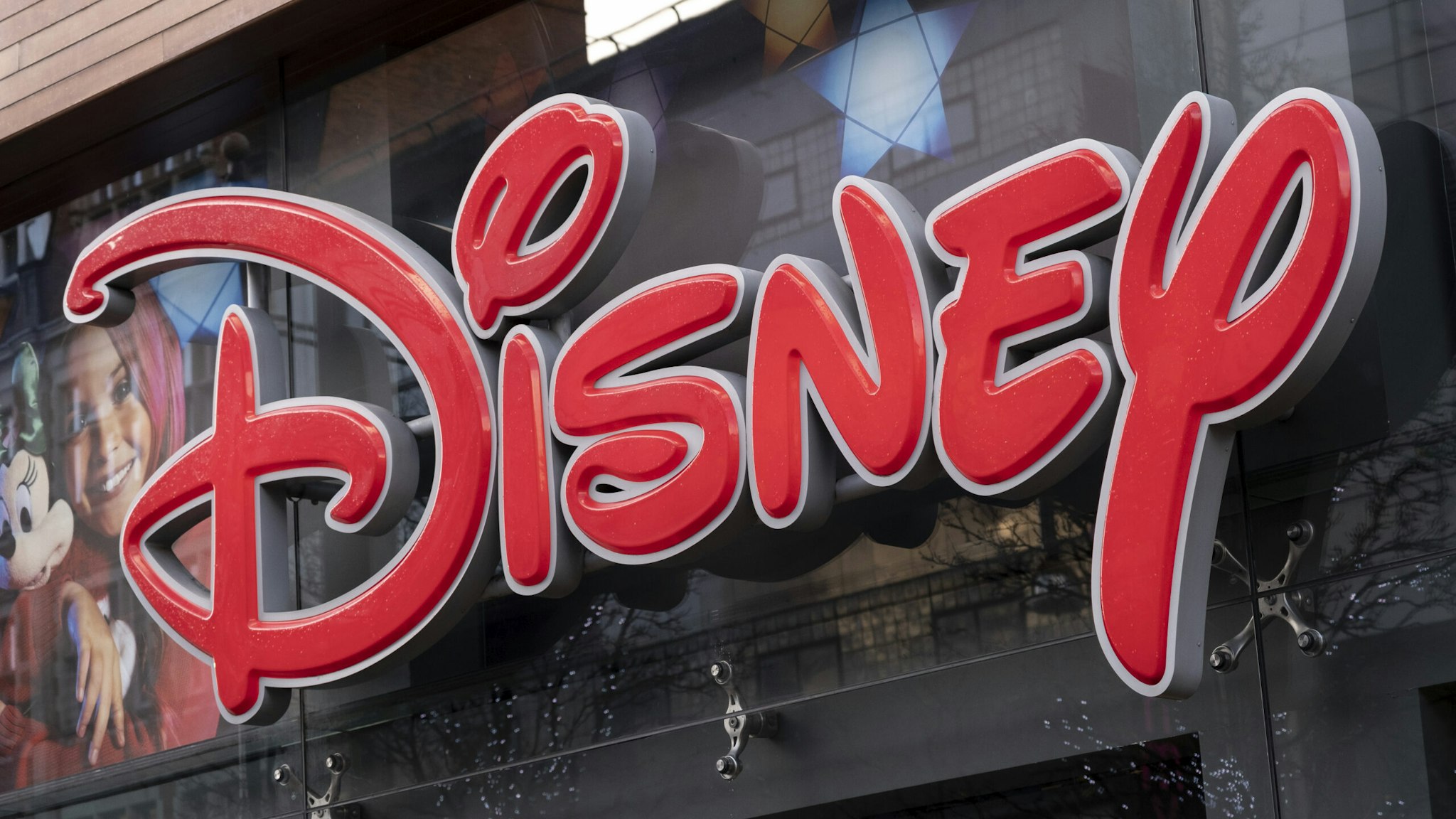 Sign for the media brand Disney Store on 19th December 2020 in London, United Kingdom. The Walt Disney Company, commonly known as Walt Disney or simply Disney, is an American diversified multinational mass media and entertainment conglomerate.