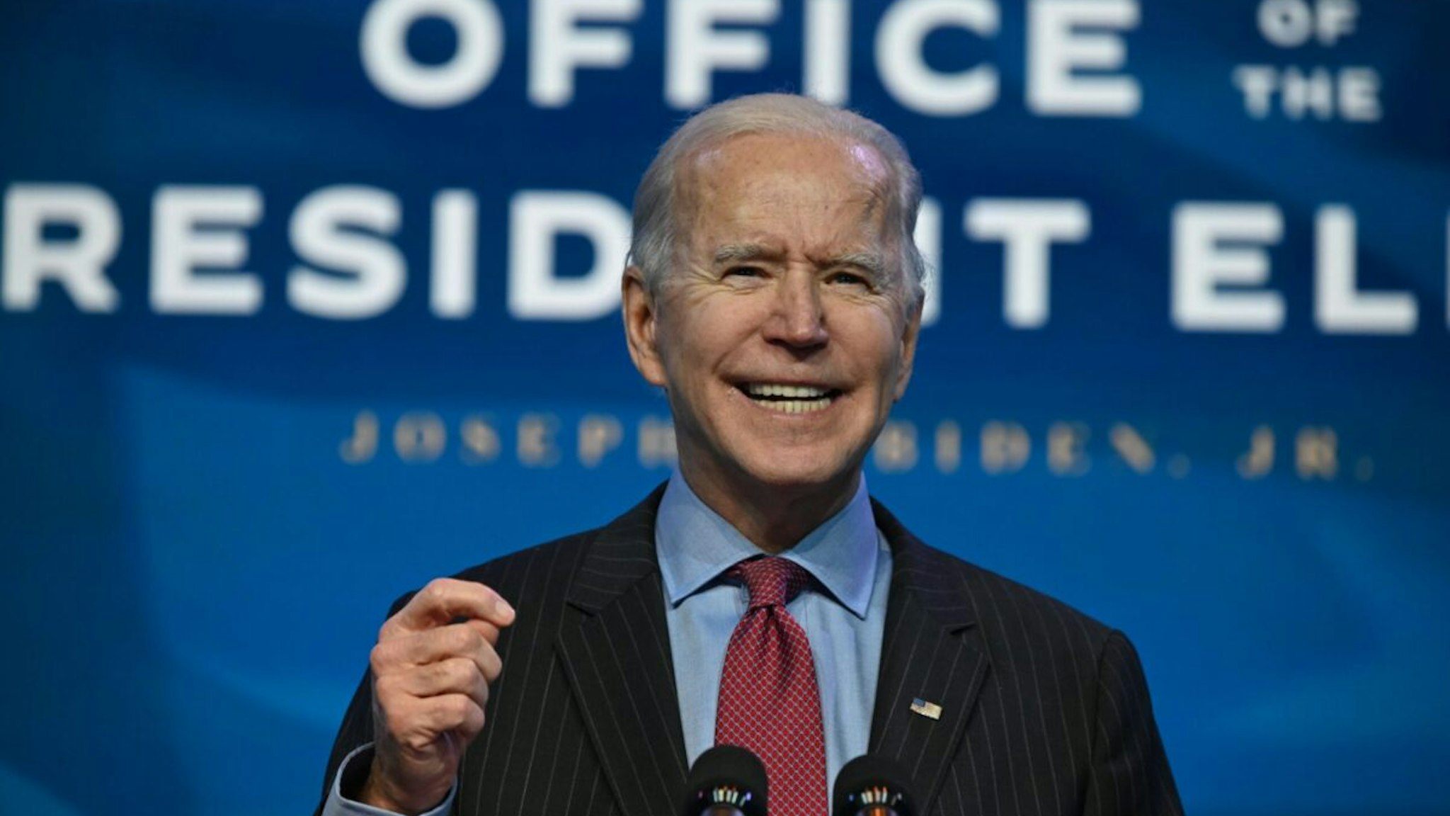 US President-elect Joe Biden speaks at The Queen theater in Wilmington, Delaware on January 8, 2021, to announce key nominees for his economic and jobs team.