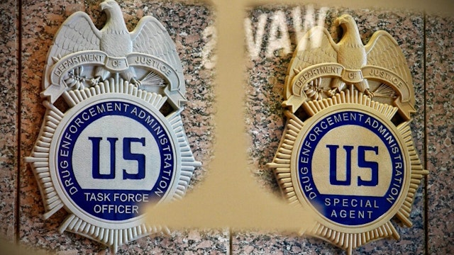 A Drug Enforcement Administration (DEA) Task Force Officer badge is displayed next to a Drug Enforcement Administration (DEA) Special Agent badge at the DEA headquarters in Arlington, Virginia, on July 13, 2022. - America's opioid crisis has reached catastrophic proportions, with over 80,000 people dying of opioid overdoses last year, most of them due to illicit synthetics such as fentanyl -- more than seven times the number a decade ago. "This is the most dangerous epidemic that weve seen," said Ray Donovan, chief of operations at the US Drug Enforcement Agency (DEA). "Fentanyl is not like any other illicit narcotic, its that deadly instantaneously."