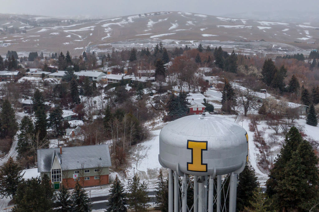 In this aerial view, the town of Moscow is seen near the neighborhood of a home that is the site of a quadruple murder on January 3, 2023 in Moscow, Idaho.