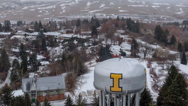 In this aerial view, the town of Moscow is seen near the neighborhood of a home that is the site of a quadruple murder on January 3, 2023 in Moscow, Idaho.