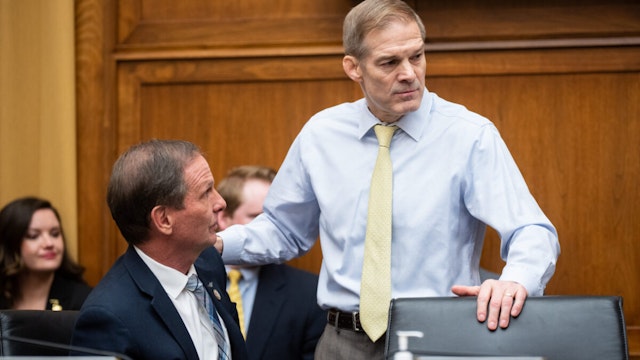Rep. Chris Stewart, R-Utah, left, speaks with chairman Jim Jordan, R-Ohio, before the start ofthe Weaponization of the Federal Government Subcommittee hearing on "Weaponization of the Federal Government" in Washington on Thursday, February 9, 2023.
