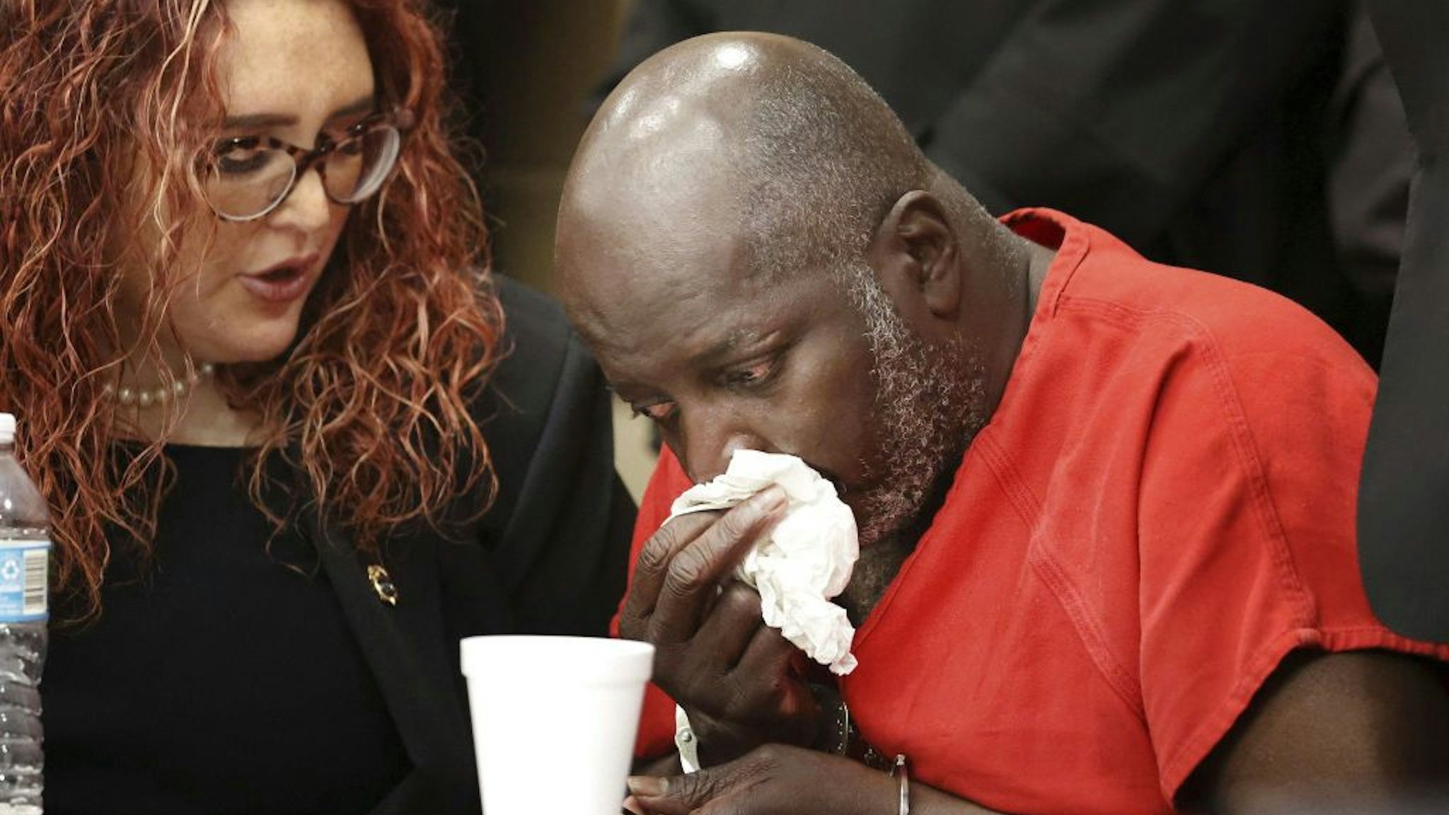 Sidney Holmes, 57, cries after he was exonerated in a Broward County courtroom on Monday, March 13, 2023.
