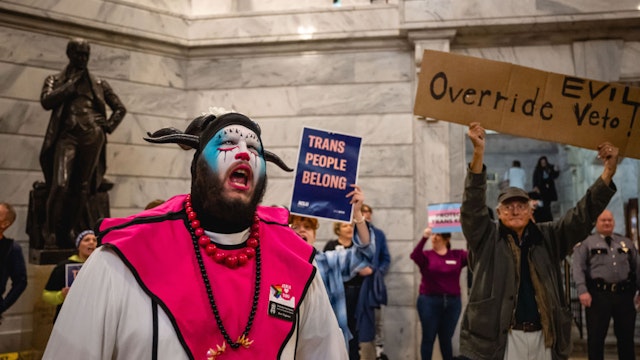 FRANKFORT, KY - MARCH 29: Ken Tagious, a genderqueer "clown nun", shouts after a press conference held by supporters of SB 150 on March 29, 2023 at the Kentucky State Capitol in Frankfort, Kentucky. SB 150, which was proposed by State Senator Max Wise (R-KY), is criticized by many as a "Don't Say Gay" bill and was vetoed by Kentucky Governor Andy Beshear during the General Assembly. Lawmakers may override this veto, passing the bill into law.