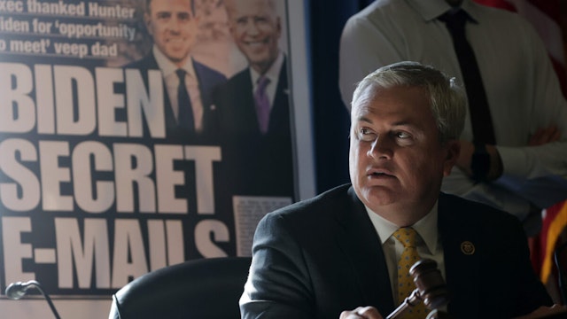 With a poster of a New York Post front page story about Hunter Biden’s emails on display, Committee Chairman Rep. James Comer (R-KY) announces a recess because of a power outage during a hearing before the House Oversight and Accountability Committee at Rayburn House Office Building on Capitol Hill on February 8, 2023 in Washington, DC.