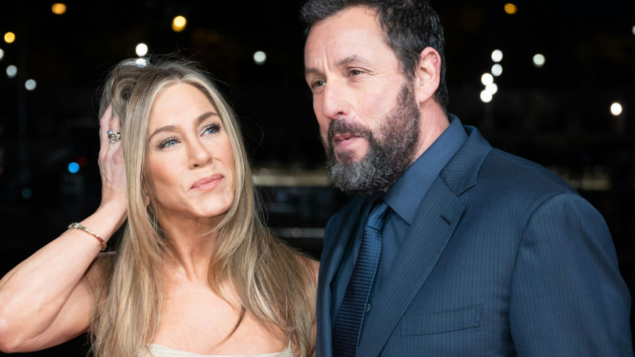PARIS, FRANCE - MARCH 16: (L-R) Jennifer Aniston and Adam Sandler attend the "Murder Mystery 2" photocall at Pont Debilly on March 16, 2023 in Paris, France. (Photo by Marc Piasecki/WireImage)