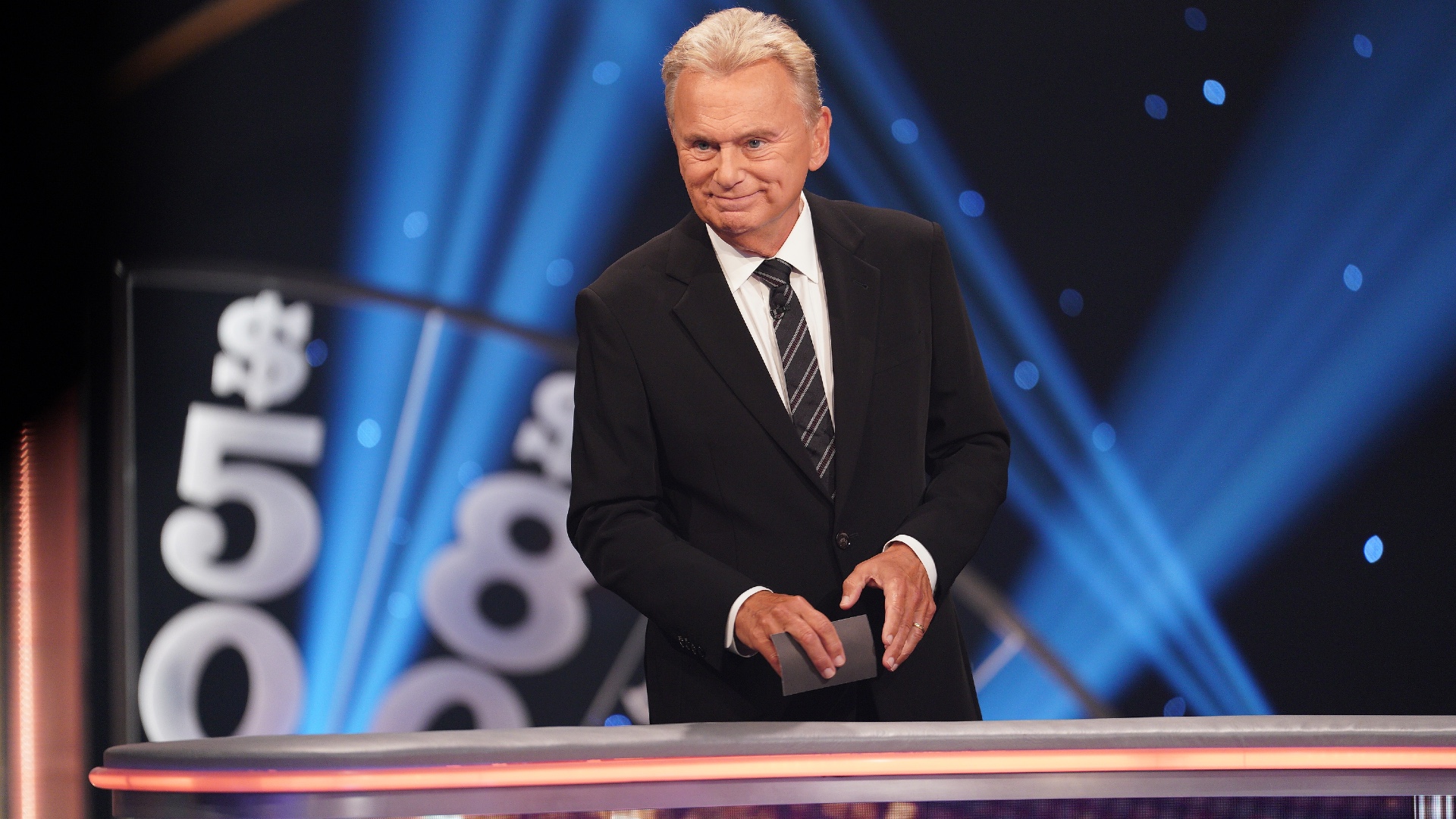 Pat Sajak Roughhouses With Wrestler Who Took Down ‘Wheel of Fortune’