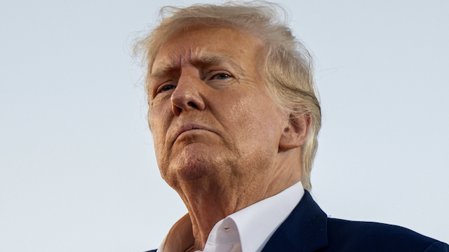 WACO, TEXAS - MARCH 25: Former U.S. President Donald Trump looks on during a rally at the Waco Regional Airport on March 25, 2023 in Waco, Texas. Former U.S. president Donald Trump attended and spoke at his first rally since announcing his 2024 presidential campaign. Today in Waco also marks the 30 year anniversary of the weeks deadly standoff involving Branch Davidians and federal law enforcement. 82 Davidians were killed, and four agents left dead.