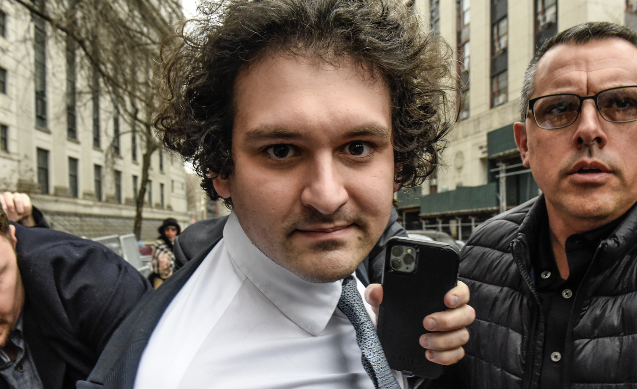 Sam Bankman-Fried, co-founder of FTX Cryptocurrency Derivatives Exchange, departs from court in New York, US, on Thursday, Feb. 16, 2023. US prosecutors said their discovery that Sam Bankman-Fried used a virtual private network to access the internet on two recent occasions raises concerns that the FTX co-founder could be hiding his online activities.