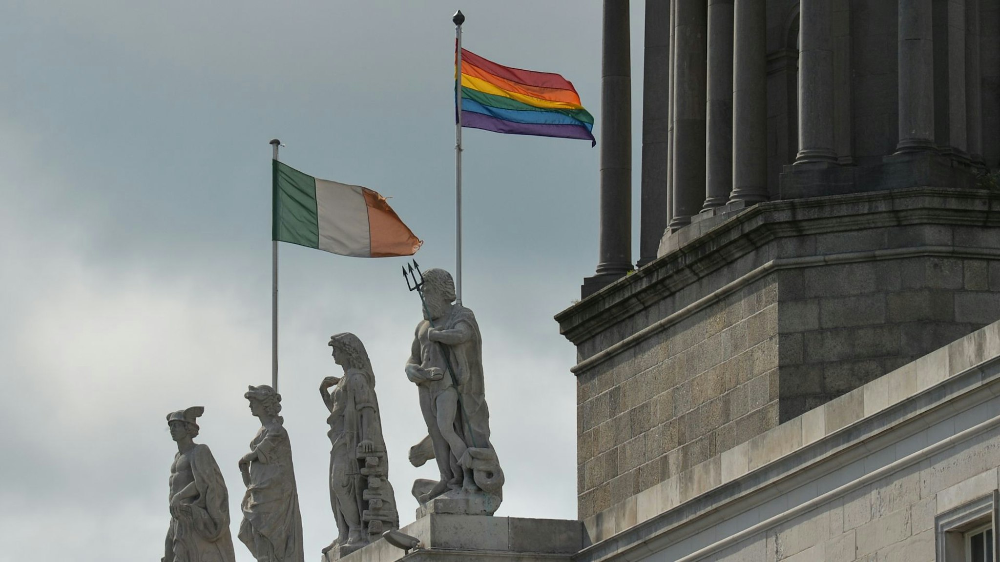 The Irish national flag and the rainbow flag seen at The Custom House in Dublin. On Thursday, 10 June 2021, in Dublin, Ireland.