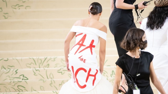 NEW YORK, NEW YORK - SEPTEMBER 13: Alexandria Ocasio-Cortez, fashion detail, attends the 2021 Met Gala celebrating 'In America: A Lexicon of Fashion' at The Metropolitan Museum of Art on September 13, 2021 in New York City. (Photo by