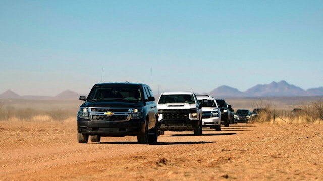 Vehicles carrying a Republican Congressional Delegation arrive at the US-Mexico Border in Cochise County near Sierra Vista, Arizona, on February 16, 2023. - Speaker of the US House of Representatives Kevin McCarthy (R-CA) led a Republican Congressional Delegation including US Representatives Juan Ciscomani (R-AZ), Lori Chavez-DeRemer (R-OR), Jen Kiggans (R-VA) and Derrick Van Olden (R-WI) to visit the US-Mexico border on February 16, 2023.