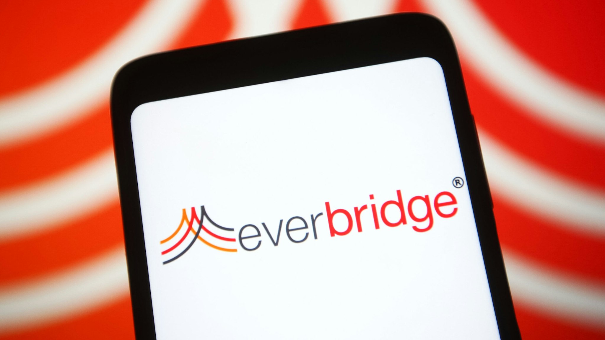 UKRAINE - 2021/06/21: In this photo illustration an Everbridge logo of a software company is seen on a smartphone screen.
