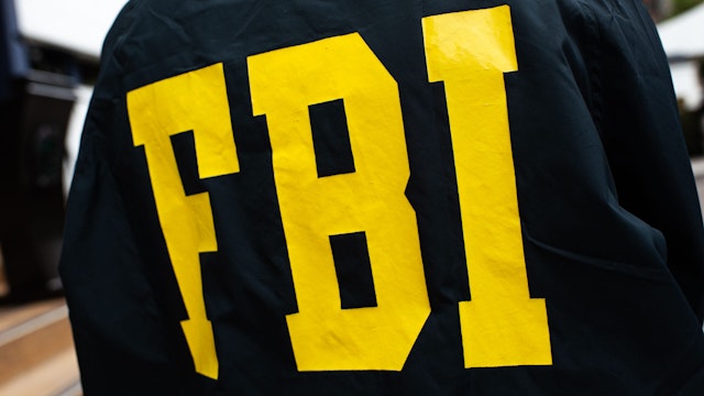 A member of the United States Federal Bureau of Investigation (FBI) poses for an ilustrative photo during a press conference between the Colombian Judicial Police (DIJIN), the Ministry of Defense and representatives of U.S. government agencies; DEA, FBI and Homeland Security (HSI) in Bogota, Colombia, March 29, 2023.