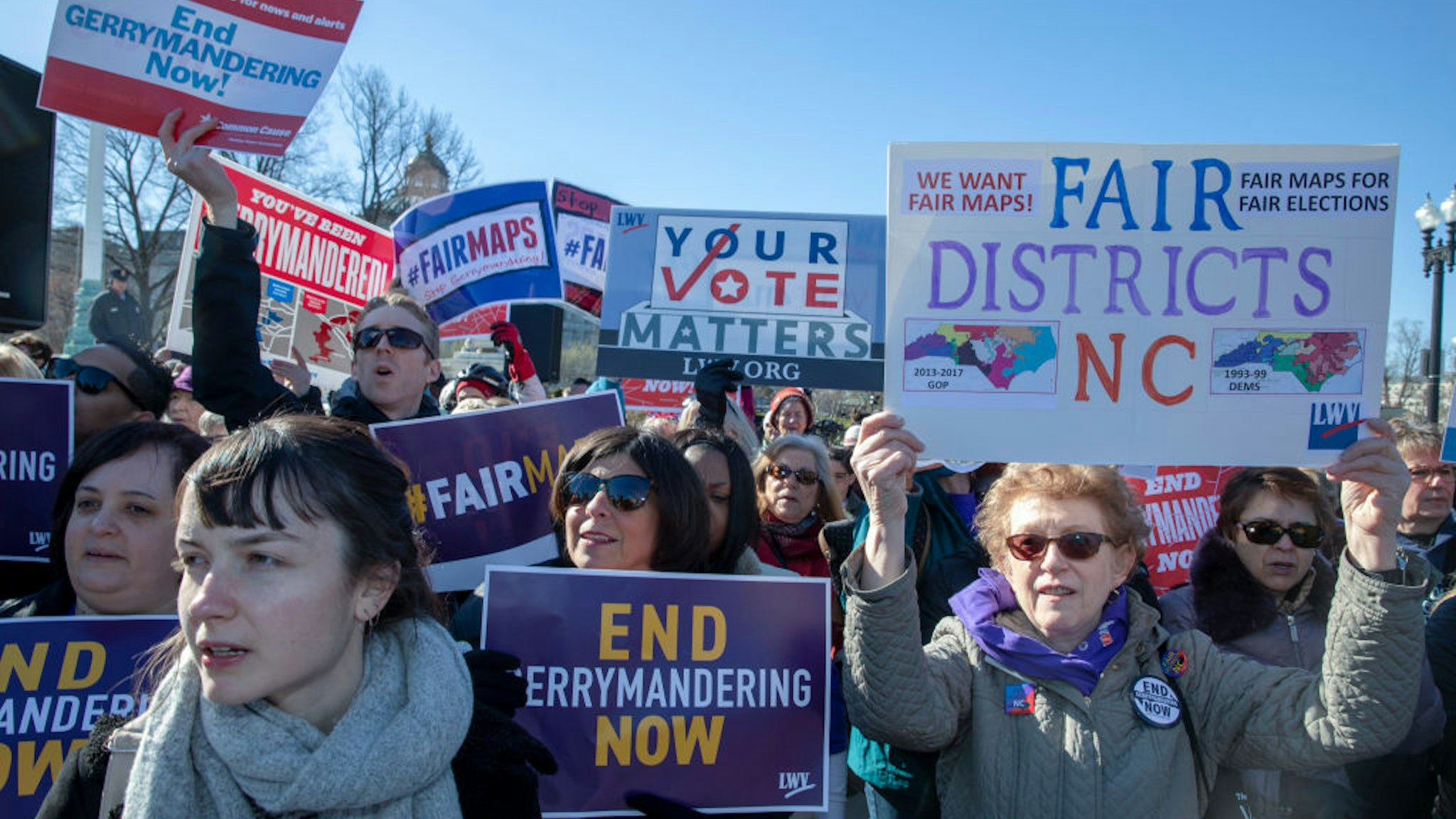 WASHINGTON, DC - MARCH 26: Protesters attends a rally for "Fair Maps" on March 26, 2019 in Washington, DC. The rally was part of the Supreme Court hearings in landmark redistricting cases out of North Carolina and Maryland