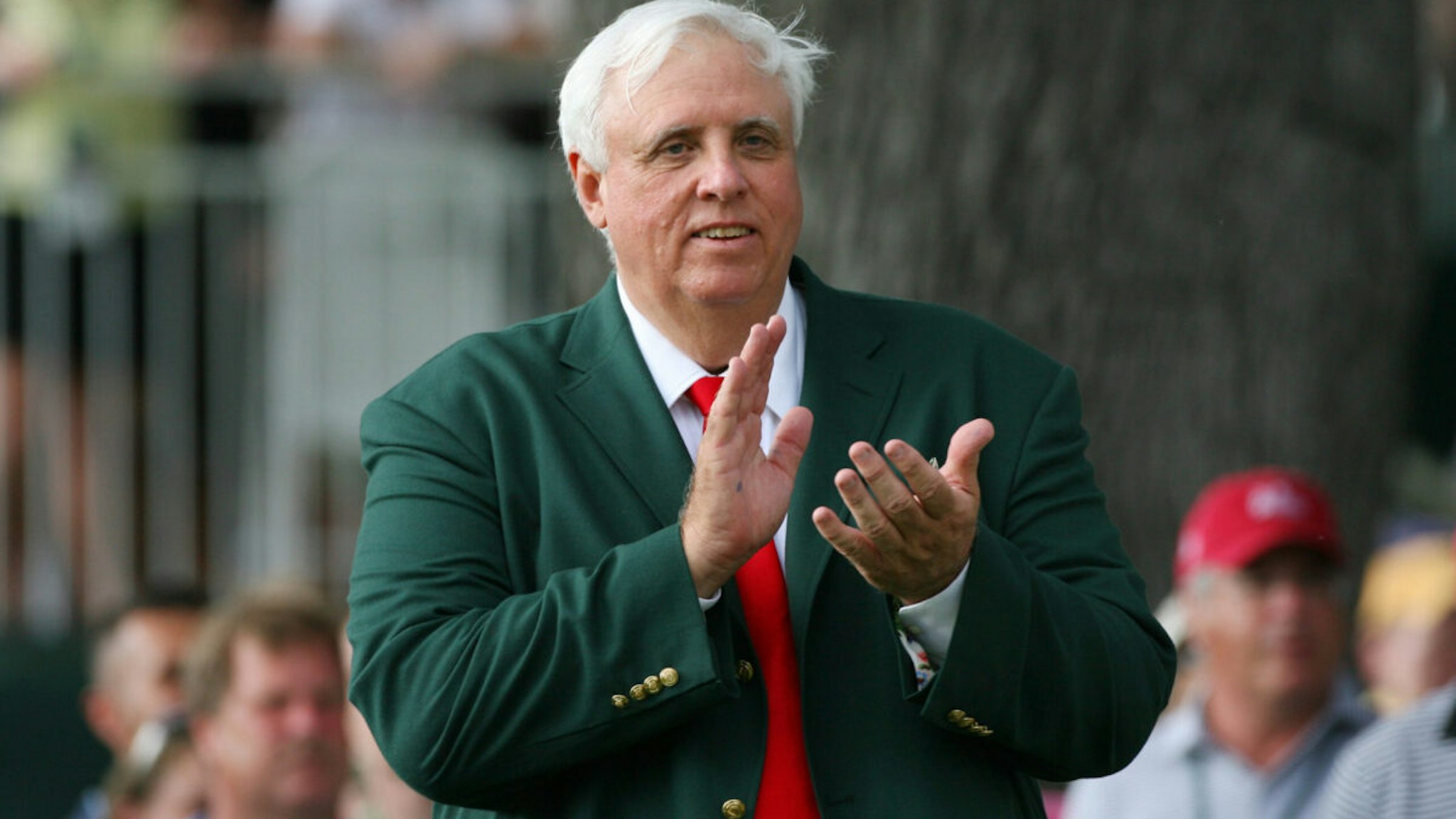 Jim Justice, owner of The Greenbrier Resort, applauds on the 18th tee during the final round of The Greenbrier Classic at The Old White TPC on July 31, 2011 in White Sulphur Springs, West Virginia.