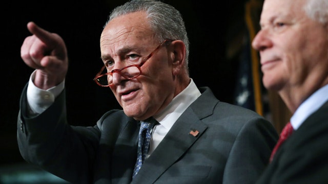Senate Minority Leader Chuck Schumer (D-NY), L, speaks as Sen. Ben Cardin (D-MD) looks on at a news conference at the U.S. Capitol on January 27, 2020 in Washington, DC.