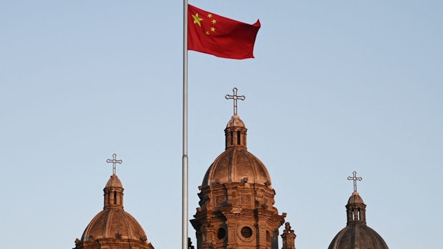 The Chinese national flag flies in front of St Joseph's Church, also known as Wangfujing Catholic Church, in Beijing on October 22, 2020, the day a secretive 2018 agreement between Beijing and the Vatican was renewed for another two years.