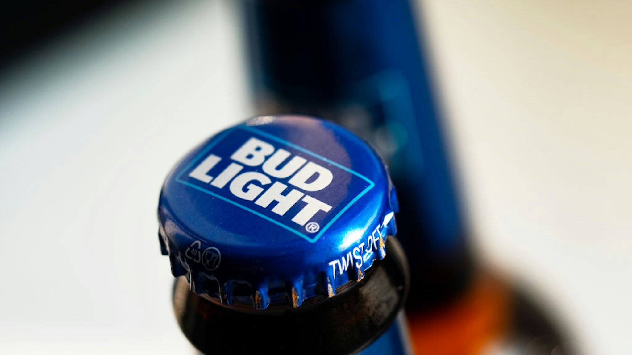UKRAINE - 2021/08/27: In this photo illustration, the Bud Light beer bottle seen displayed in a store. This beer is produced by Anheuser-Busch, ink. (Photo Illustration by Igor Golovniov/SOPA Images/LightRocket via Getty Images)