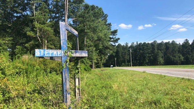 A wooden memorial on the side of Sandy Run Road in rural Hampton County, South Carolina, where 19-year-old Stephen Smith was found dead in 2015.