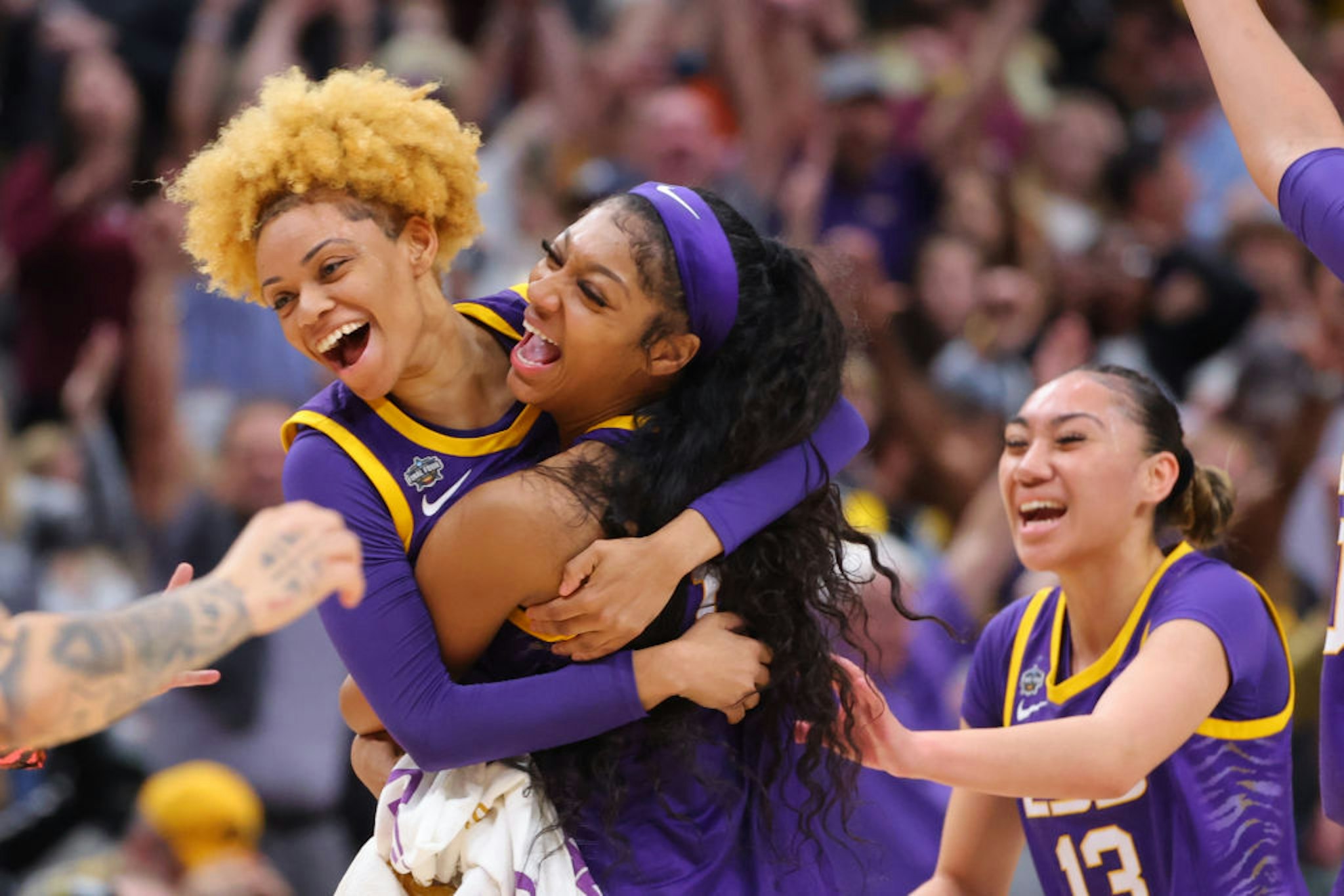 DALLAS, TX - APRIL 02: Jasmine Carson #2 and Angel Reese #10 of the Louisiana State Tigers celebrate a three-point goal against the Iowa Hawkeyes during the 2023 NCAA Women's Basketball Tournament National Championship at American Airlines Center on April 2, 2023 in Dallas, Texas. (Photo by C. Morgan Engel/NCAA Photos via Getty Images)