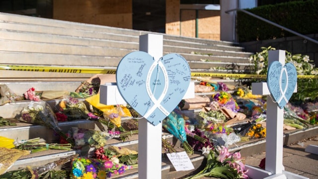 A makeshift memorial is set up on the steps of the Old National Bank, site of the April 10, 2023, shooting in Louisville, Kentucky, on April 12 2023.