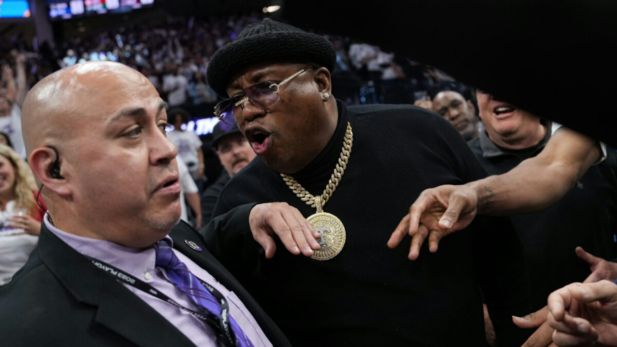 Earl Tywone Stevens Sr., known as the rapper E-40, yells at arena security personnel before being escorted from courtside seating during Game One of the Western Conference First Round Playoffs between the Golden State Warriors and Sacramento Kings at the Golden 1 Center on April 15, 2023 in Sacramento, California.