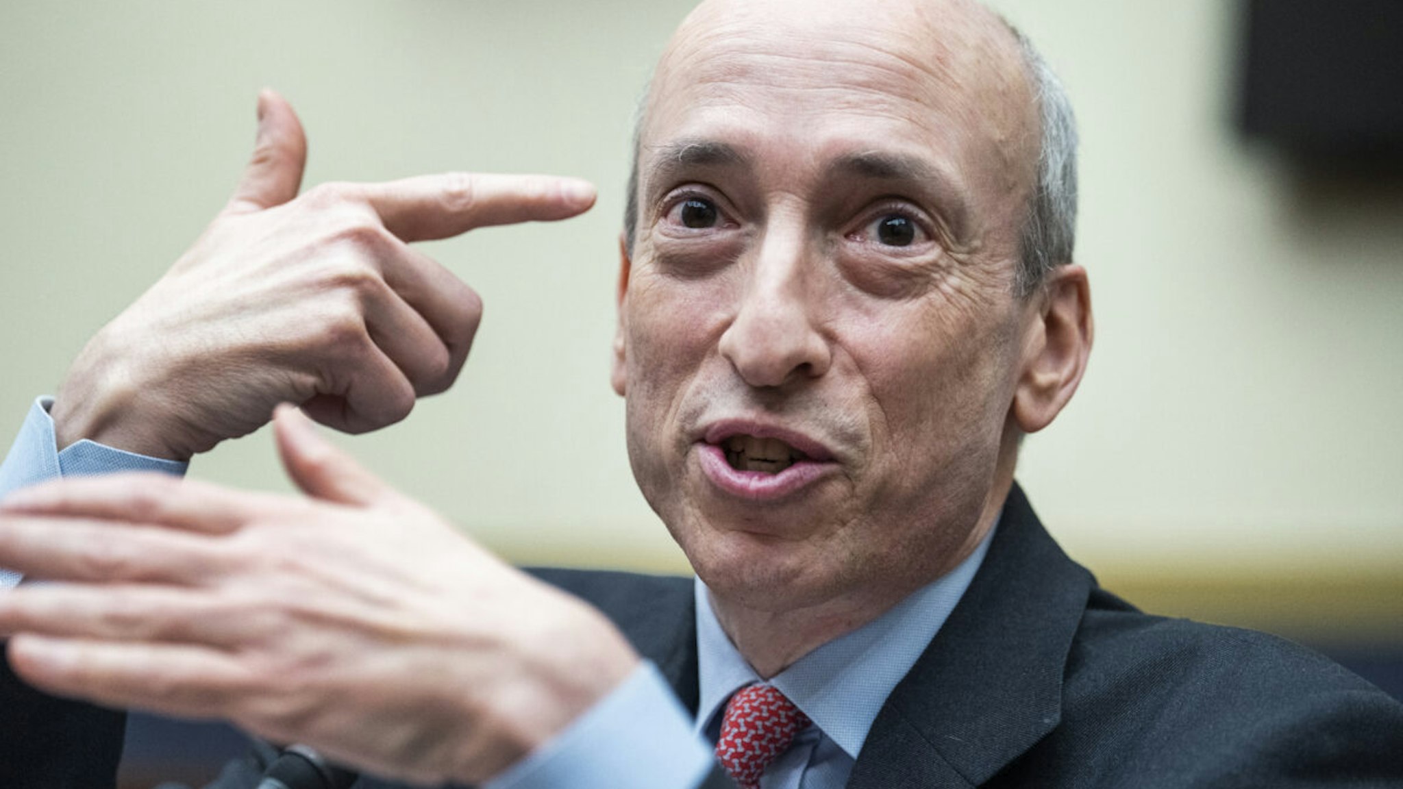 SEC Chair Gary Gensler mocks putting a gun to his head in response to a "Blazing Saddles" reference by Rep. Emanuel Cleaver, D-Mo., during the House Financial Services Committee hearing titled "Oversight of the Securities and Exchange Commission," in Rayburn Building on Tuesday, April 18, 2023.