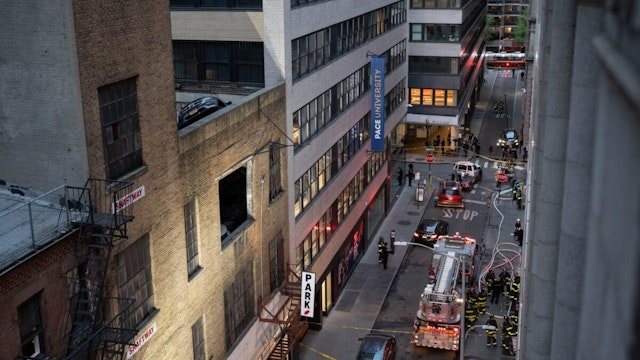 NEW YORK, UNITED STATES - APRIL 18: Firefighters inspect the partially collapsed parking garage in Manhattan, New York, United States on April 18, 2023. A parking garage partially collapsed in New York City on Tuesday, leaving at least one person dead and several others injured.