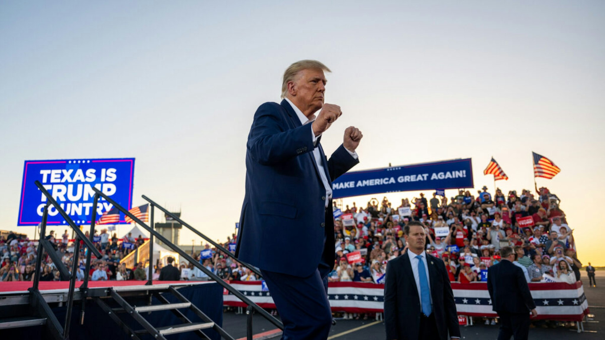 WACO, TEXAS - MARCH 25: Former U.S. President Donald Trump dances while exiting after speaking during a rally at the Waco Regional Airport on March 25, 2023 in Waco, Texas. Former U.S. president Donald Trump attended and spoke at his first rally since announcing his 2024 presidential campaign. Today in Waco also marks the 30-year anniversary of the deadly standoff involving Branch Davidians and federal law enforcement.