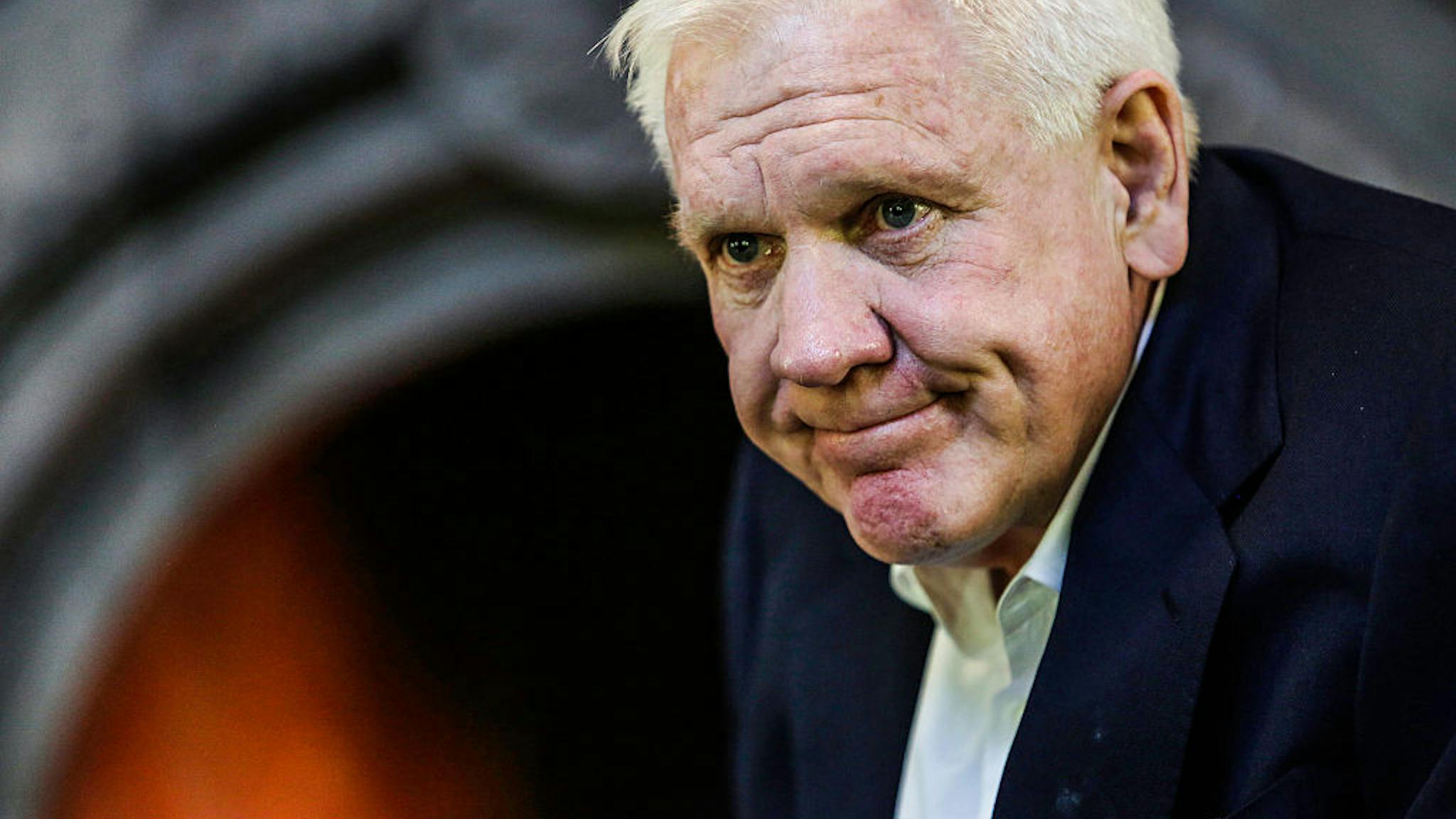 Harlan Crow Transforms Former Hospital Into Campus For Hedge Funds & Family Offices Harlan Crow, chairman and chief executive officer of Crow Holdings LLC, sits for a photograph at the Old Parkland estate offices in Dallas, Texas, U.S., on Friday, Oct. 2, 2015. What was once a psychiatric hospital, Old Parkland became the pet project of Crow; on its campus are seven Jeffersonian-style buildings that house a hive of private-equity firms, hedge funds, foundations and family offices. Photographer: Chris Goodney/Bloomberg via Getty Images