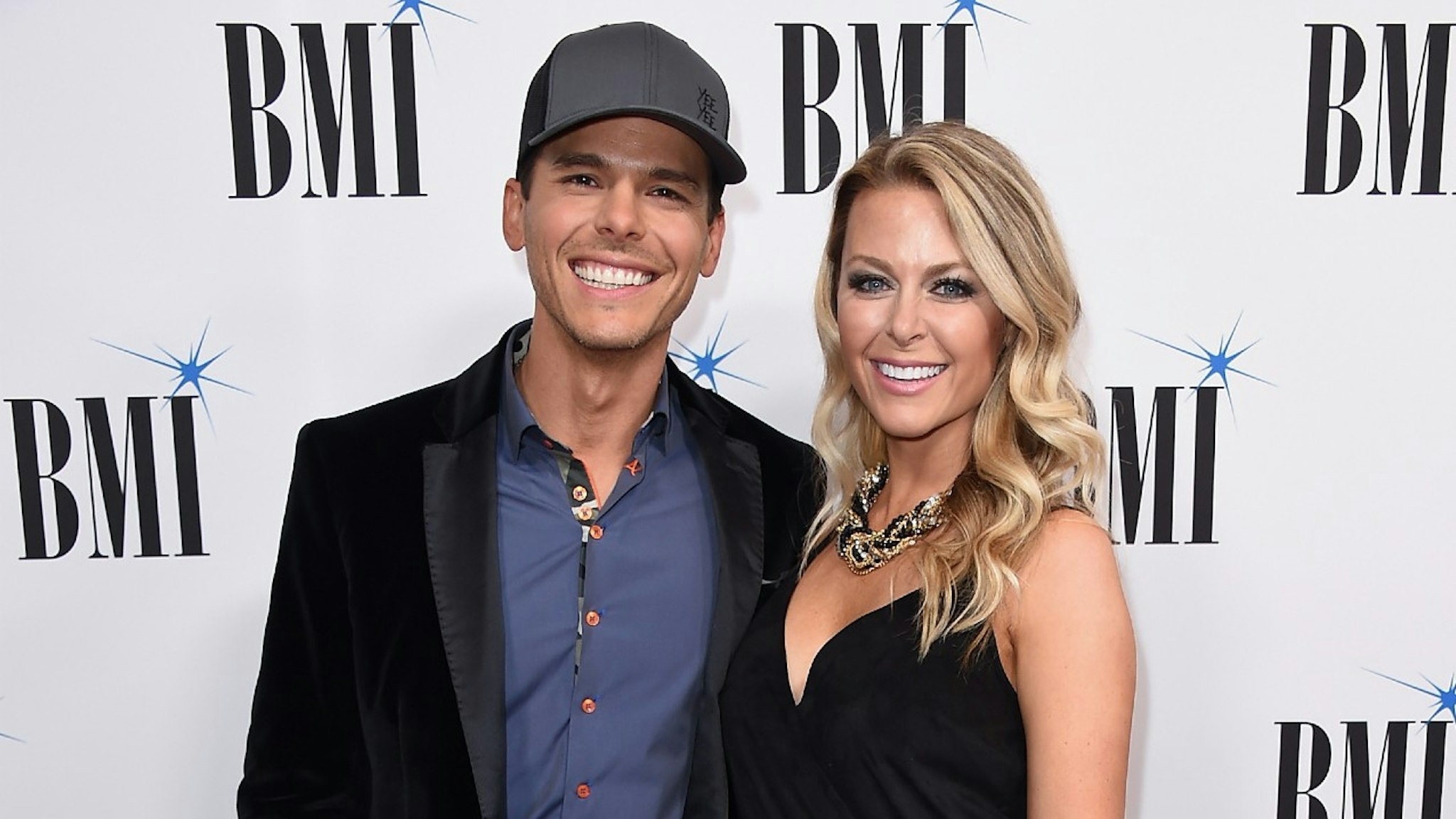 Singer-songwriter Granger Smith (L) and Amber Bartlett attend the 65th Annual BMI Country awards on November 7, 2017 in Nashville, Tennessee.