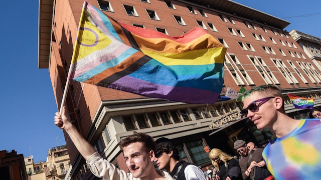 ROME, ITALY - 2023/04/01: A person holds up an Intersex-Inclusive Progress Pride Flag during the Transgender Day of Visibility demonstration in Rome. The demonstration is part of the Transgender Day of Visibility, an annual event occurring on March 31 dedicated to celebrating transgender people and raising awareness of discrimination faced by transgender people worldwide. (Photo by Vincenzo Nuzzolese/SOPA Images/LightRocket via Getty Images)